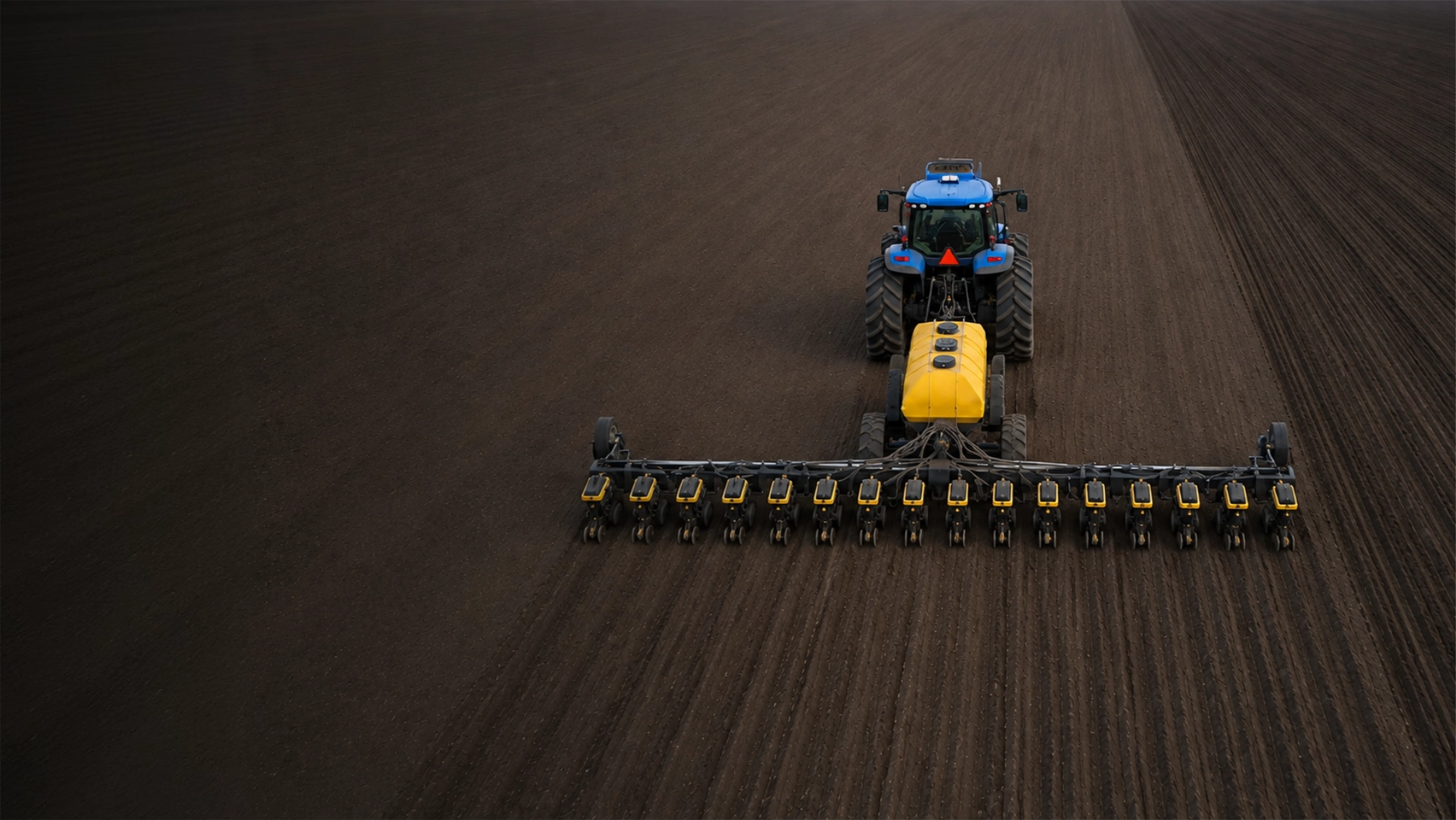 Precision vision spraying system operating with a tractor in a crop field